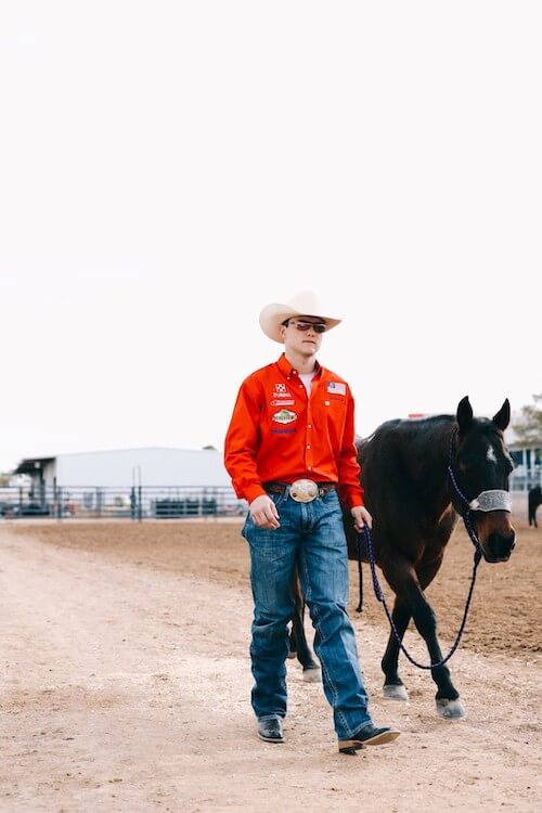 Kincade Henry walking a horse